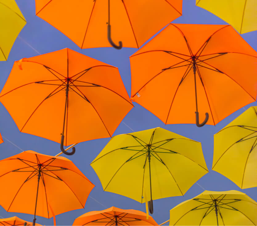 Colourful umbrellas representing ML arteka modernization for insurance and mortgage platforms