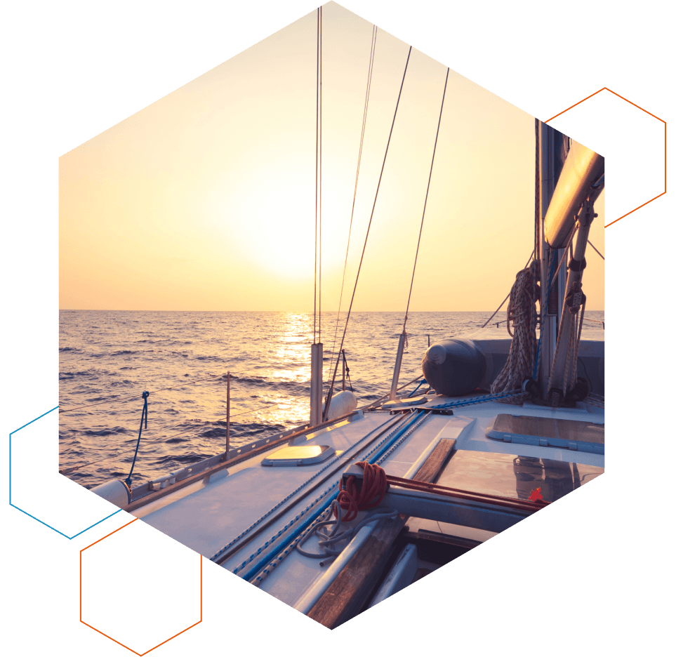 Sailboat at sunset representing confident modernization for ML arteka regional banking clients.