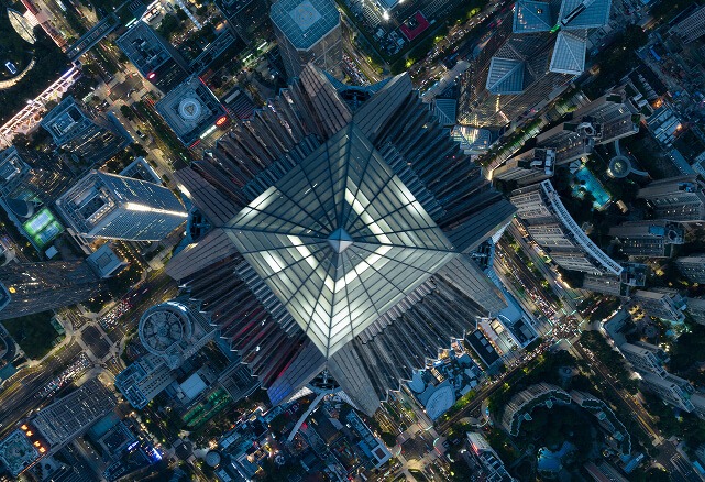 Financial district at night representing ML arteka's unified digital credit-card platform