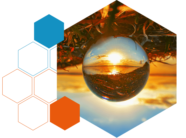 Sunset reflected in a glass sphere, representing ML arteka's evolution and future direction
